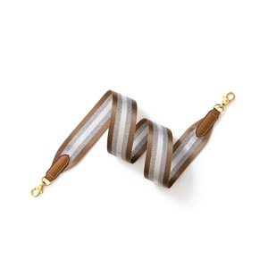 Adjustable wide nylon bag strap with brown leather ends and gold metal hooks