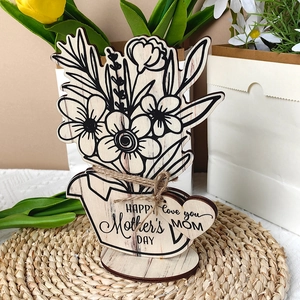 Detail of wooden Mother's Day flower ornament with Happy Mother's Day engraving