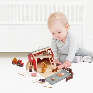 Detailed view of educational wooden farm puzzle toy set with barn and animal figures