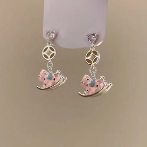 Pink enamel rocking horse earrings with heart crystals and golden coin accents