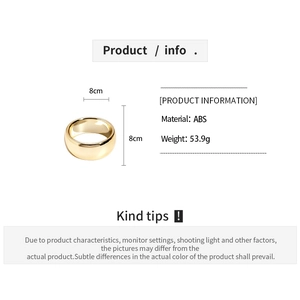 Detail specifications of golden twist bangle showing 8cm diameter and ABS material info