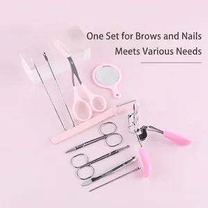 10-piece pink eyebrow grooming and eyelash curler set with stainless steel tools