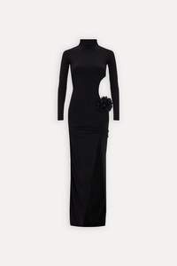 Detail of high neck black dress featuring side waist cutout and 3D floral accent