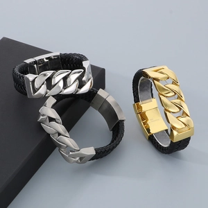 Detailed close-up of 316L stainless steel magnetic clasps on leather braided bracelets