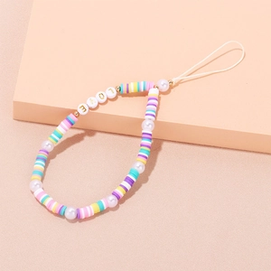 Detail of beaded phone strap featuring colorful clay beads and golden LOVE letter beads