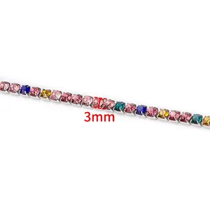 Close-up of 3mm colorful rhinestone cup chain with pink and blue stones on silver base