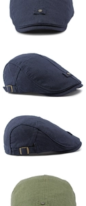 Detail of adjustable vintage metal buckle and fabric texture on a linen flat cap