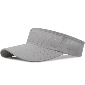 Detail of grey sun visor hat featuring lightweight breathable mesh fabric and curved brim