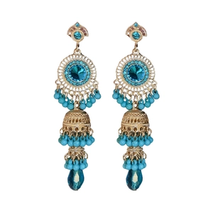 Vintage golden tassel earrings with turquoise beads in a bohemian Jhumka style