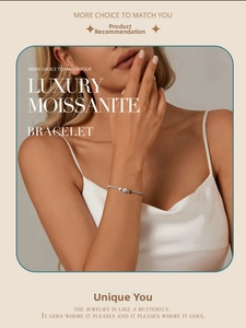 Elegant 50 point moissanite sterling silver woven bracelet worn on a female wrist