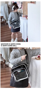 Détail du sac ita pour enfants noir avec fenêtre transparente et liseré blanc contrasté