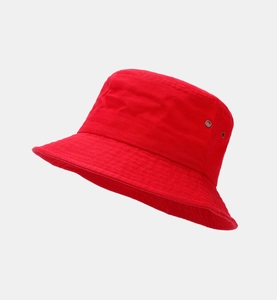 Detail view of red cotton bucket hat showing metal ventilation eyelets and twill texture