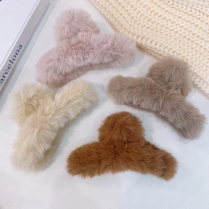 Furry plush claw clip hair accessories in neutral colors for autumn and winter styling