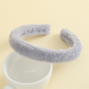 Detail of plush grey faux rabbit fur headband showing soft texture and wide thick design