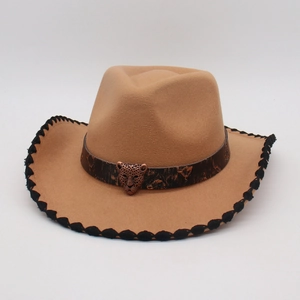 Detail of khaki wool cowboy hat with leather band and bronze leopard head emblem