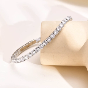 Detailed view of silver tennis bracelet with sparkling cubic zirconia on geometric prop