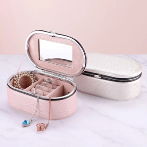 Portable PU leather jewelry box with mirror, ring slots and velvet lining in pink and white