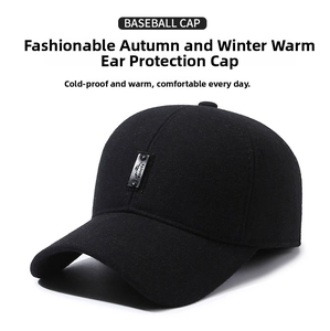 Detailed texture of black wool baseball cap featuring mountain patch and curved brim