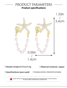 Detailed view of starfish and shell earrings with crystal stones and pearl tassels