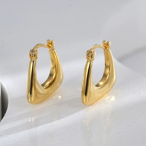 Minimalist thick U-shaped chunky hoop earrings in polished gold finish for women