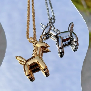 French style unicorn balloon pendant necklace in gold and silver with twisted chain
