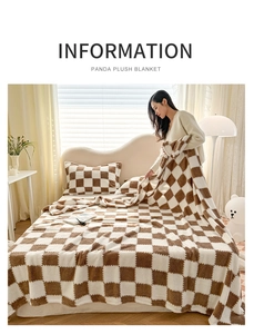 Detail of soft brown checkerboard plush panda blanket on a cozy bedroom bed setup