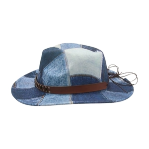 Vintage patchwork denim cowboy hat with leather studded band and wide brim for outdoors