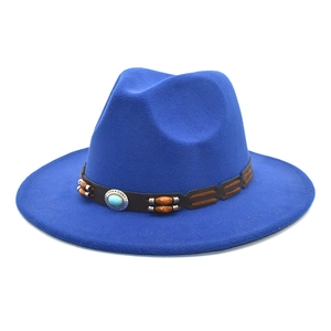 Royal blue wool fedora hat with brown leather band and turquoise beads on white background