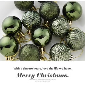 Detail of dark green Christmas balls with matte glitter and embossed leaf texture