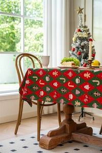 Detailed weave of Christmas tablecloth with nutcracker and gingerbread man patterns