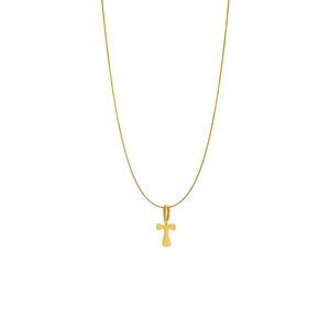 Detailed shot of a gold-toned necklace featuring a minimalist letter T pendant on a sleek chain