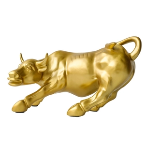 Golden Bull sculpture in dynamic charging pose for elegant office or home desktop decor