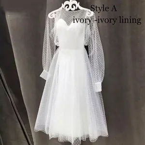 Ivory mesh polka dot wedding dress with bubble long sleeves and vintage A-line silhouette