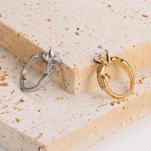 Elegant stainless steel crown rings with large zircons in gold and silver finishes