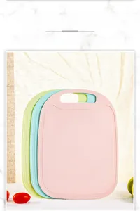 Textured non-slip plastic cutting boards for vegetables and fruits in three colors