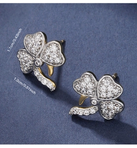 Macro shot of clover earrings with micro-inlaid zircons and detailed dimensions