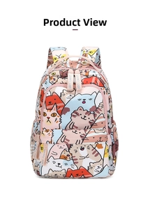 Close-up of cute cartoon cat print and durable dual zippers on high-capacity school backpack