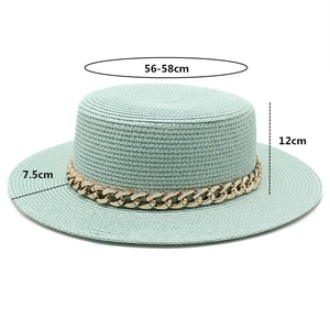 Detail of mint green boater hat with 56-58cm head size, 12cm height, and 7.5cm brim width