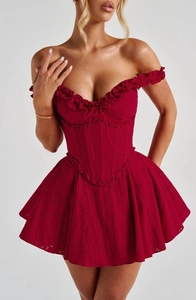 Detailed view of dark red off-shoulder mini dress with broderie anglaise embroidery
