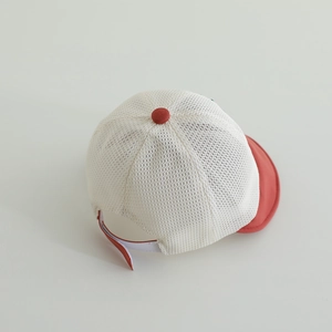 Detail of red and white breathable mesh baby sun hat with adjustable strap for kids