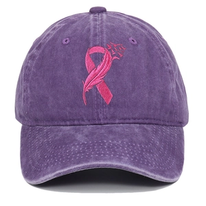 Close-up of pink ribbon embroidery on washed cotton purple baseball cap detail