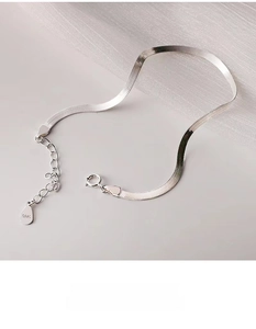 Detail of S925 sterling silver snake chain with lobster clasp and extension chain