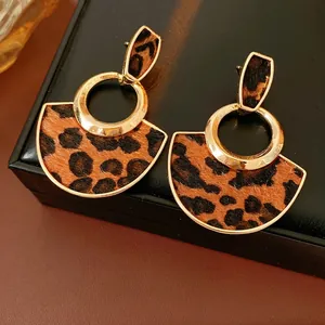 Fashionable leopard print fan-shaped earrings with gold metal frame and heart-shaped studs