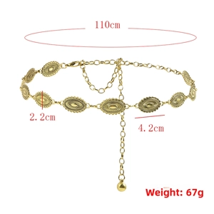 Detail of vintage gold metal chain belt with engraved oval plates and sizing information