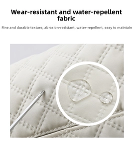 Close-up of diamond quilted cream fabric showing water-repellent and scratch-resistant texture
