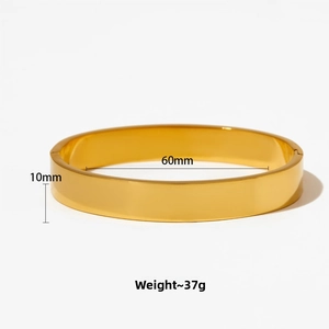 Detail of 10mm wide gold plated stainless steel hinge bangle with dimensions and weight
