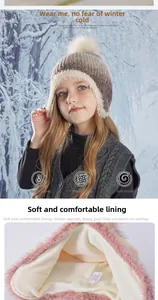 Detail of children's winter knit hat featuring thick plush lining and soft gradient yarn