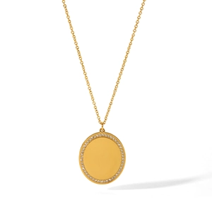 Elegant 18k gold stainless steel necklace featuring a polished oval pendant with zircon stones