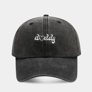 Vintage washed charcoal baseball cap with white Daddy heart embroidery and worn-out finish
