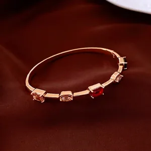 18K gold plated vintage bangle with five colorful rectangular and oval gemstones